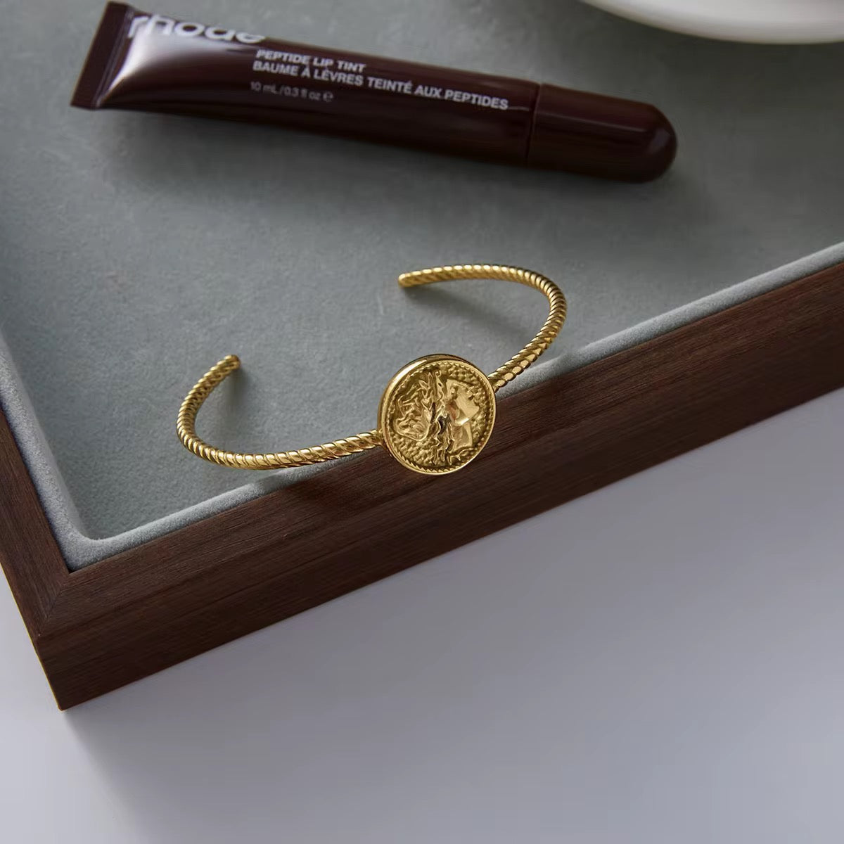 Gold Royal Coin Twisted Bangle